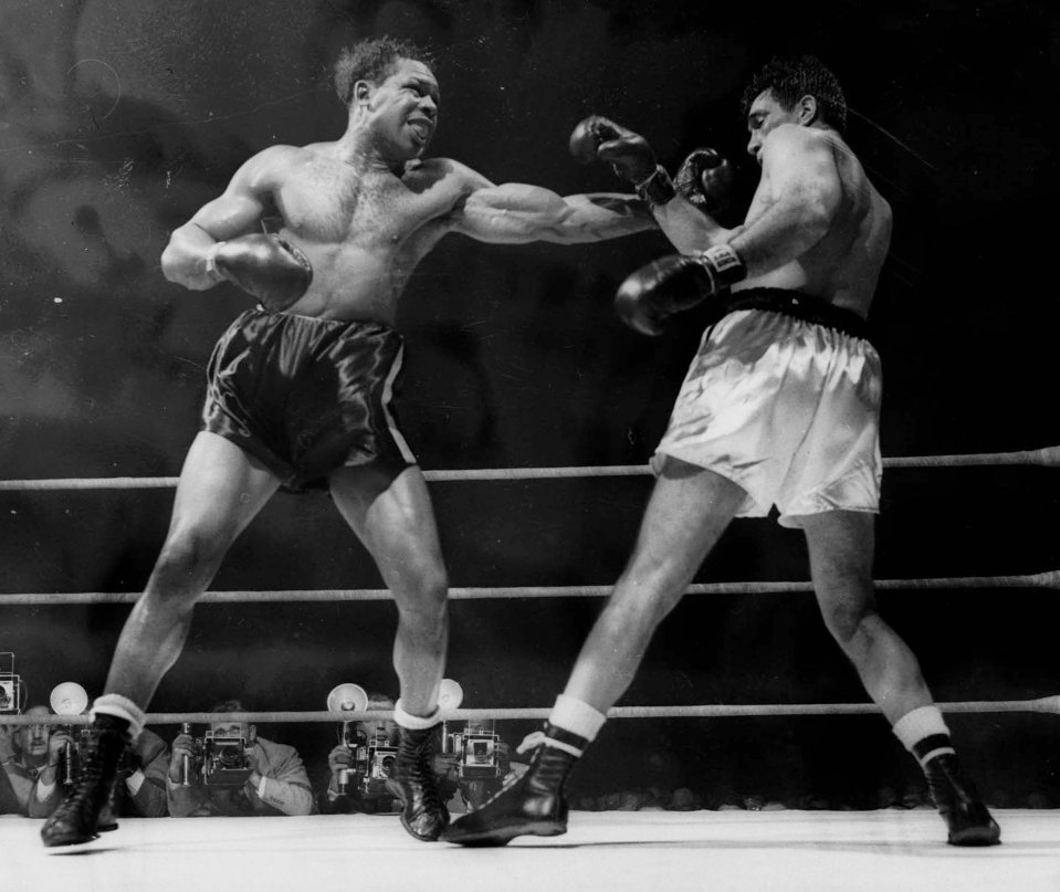  Archie Moore, left, had a 28-year career scoring 131 stoppages