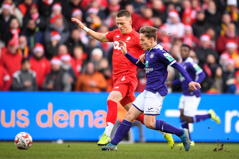  The midfielder was playing against Standard Liege when he collided with Dimitri Lavalee on the hour mark