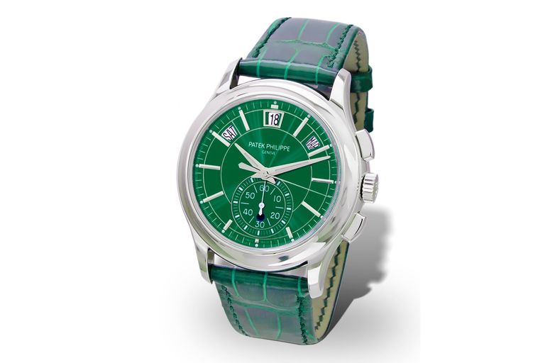  The Patek Philippe wristwatch has a crocodile strap, platinum casing and a green face