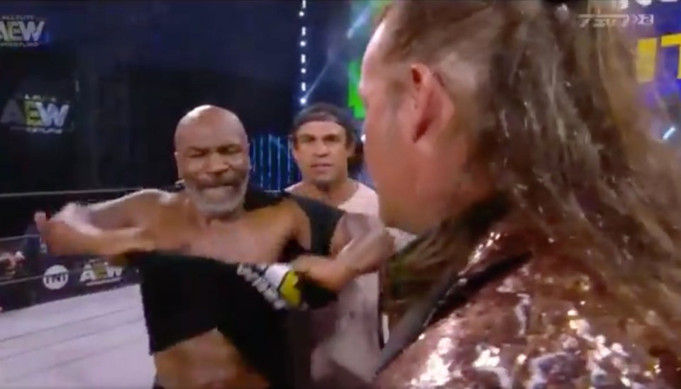  Tyson ripped his shirt off after confronting Jericho