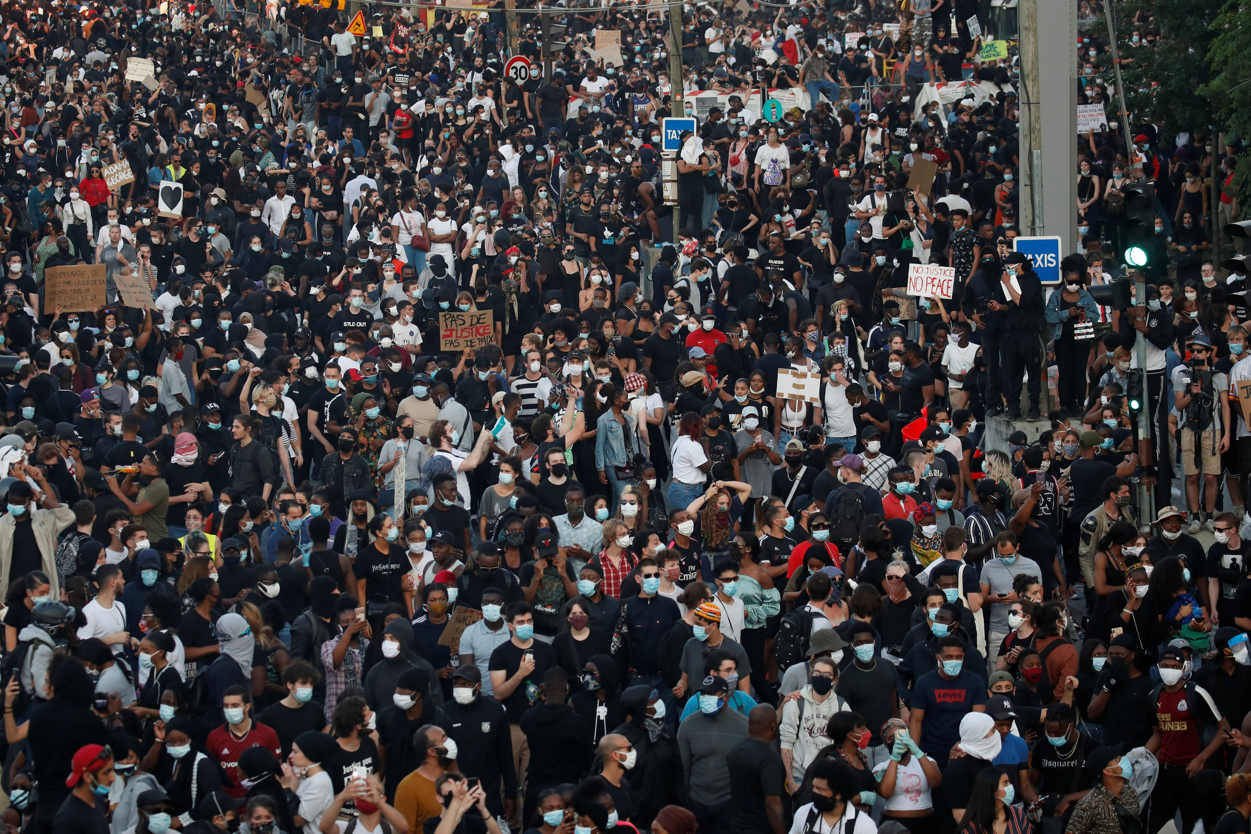  A crowd of about 20,000 gathered in Paris on Tuesday evening