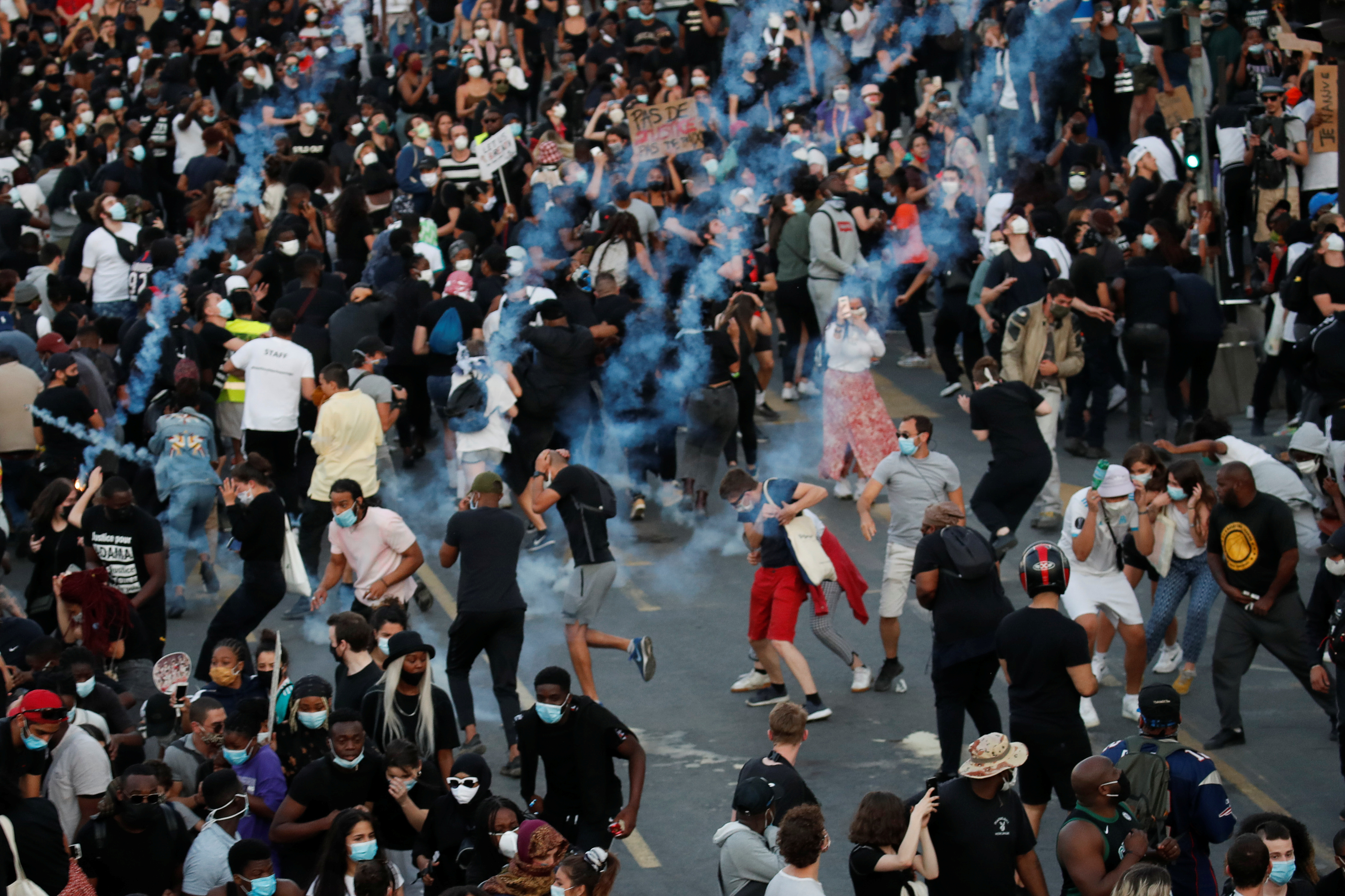  Tear gas is released at the banned demonstration planned in memory of Adama Traore, a 24-year old black Frenchman, in Paris