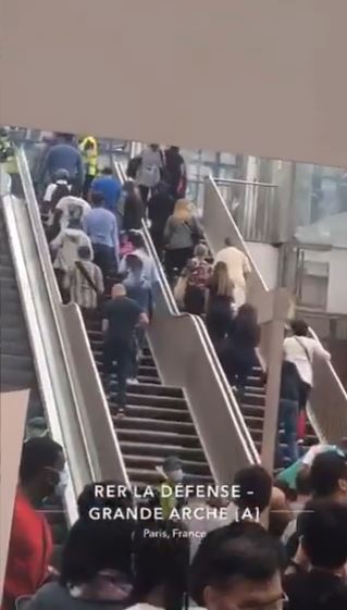 People seen leaving the station via a staircase