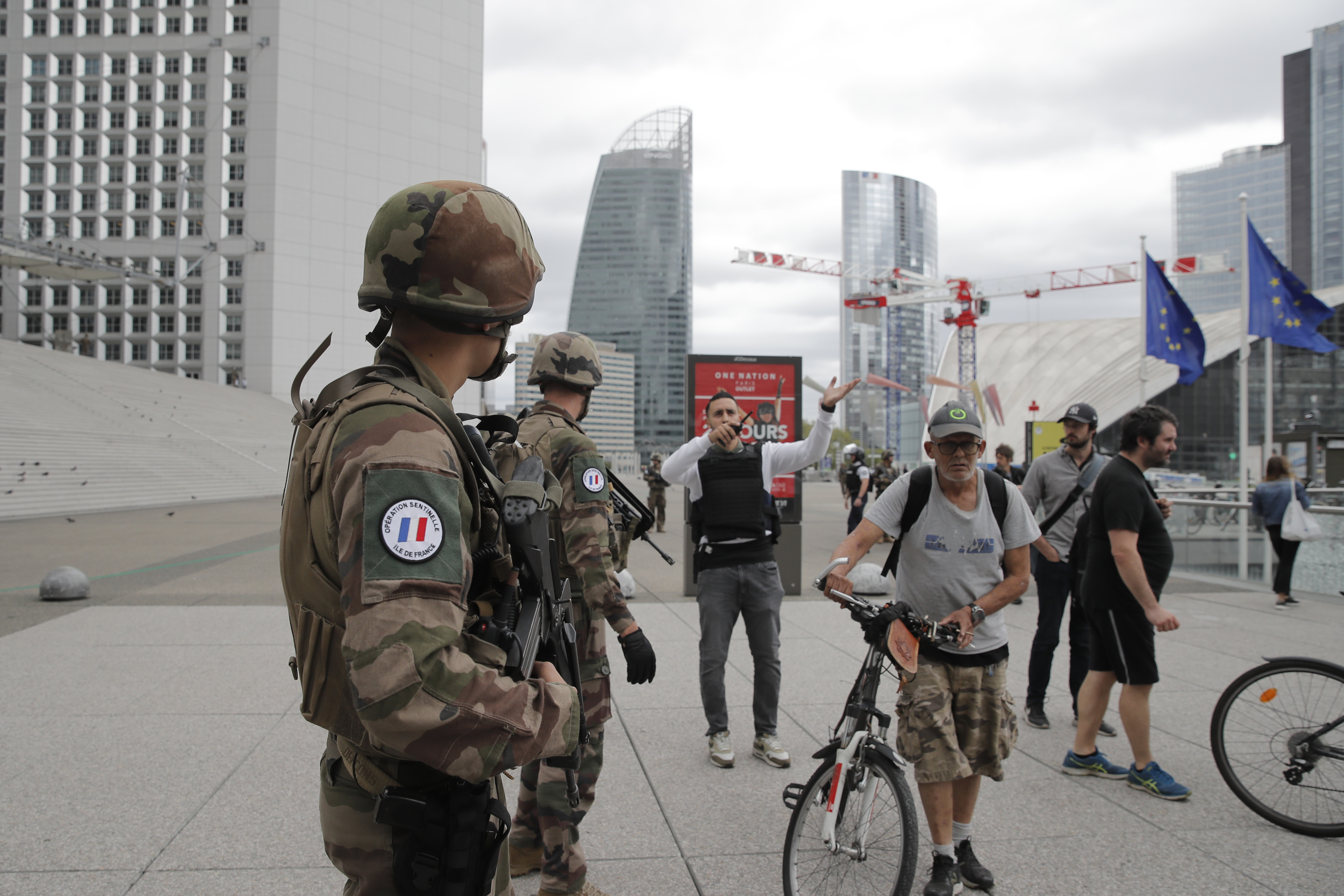 Troops direct passersby following the evacuation