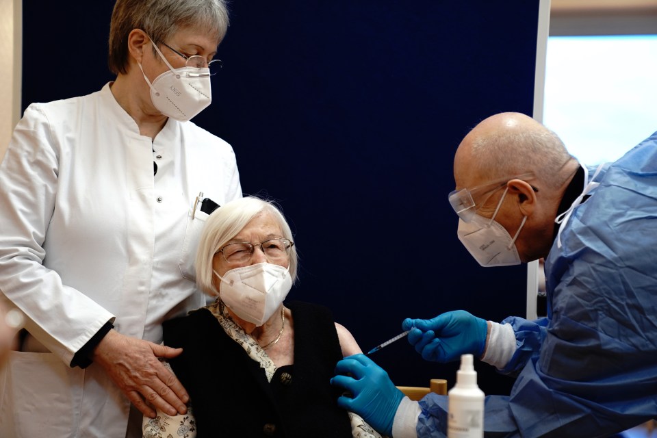 Gertrud Haase, 101, is vaccinated at the Agaplesion Bethanien Sophienhaus care home in Berlin, Germany