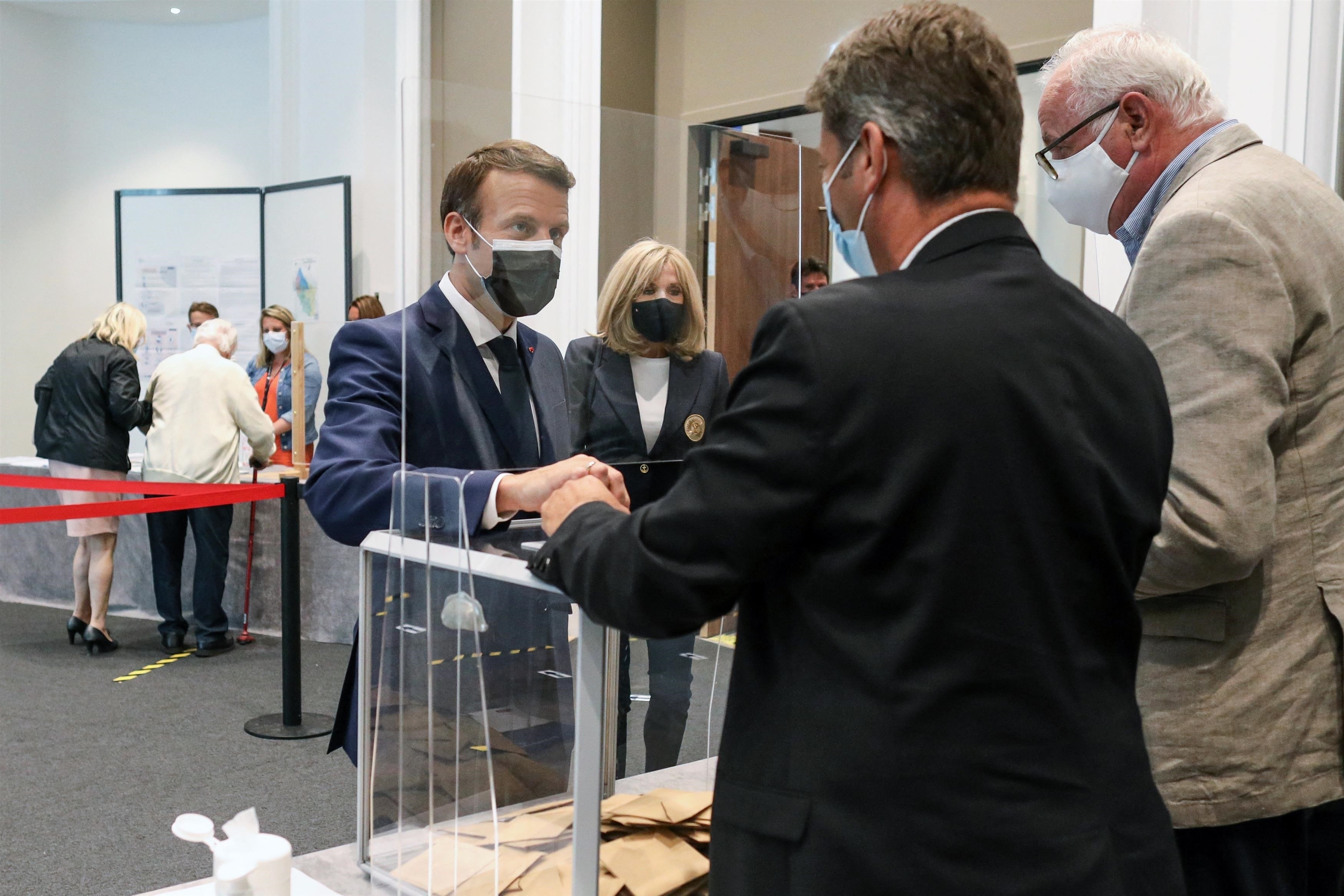 The French president casting his ballot in Sunday's regional elections in France