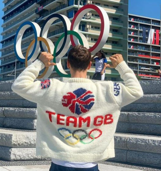 Ever the good sport, Tom Daley kept us entertained with his hand-knitted creations