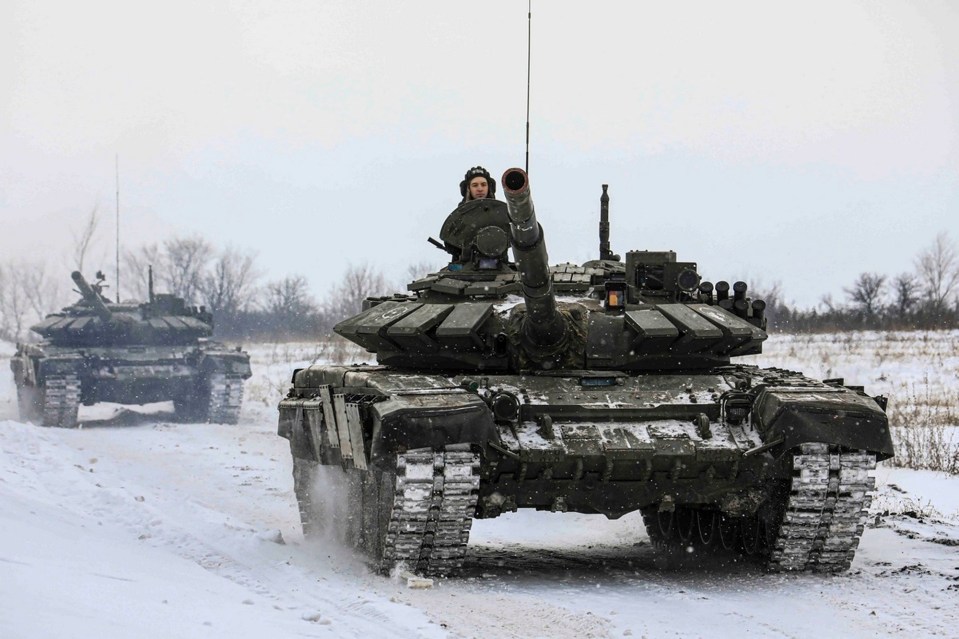 Russian tanks roll during drills in the Leningrad region