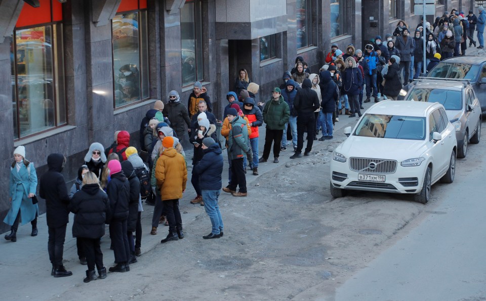 With interest rates doubling overnight, queues built up as desperate Russians salvaged their savings