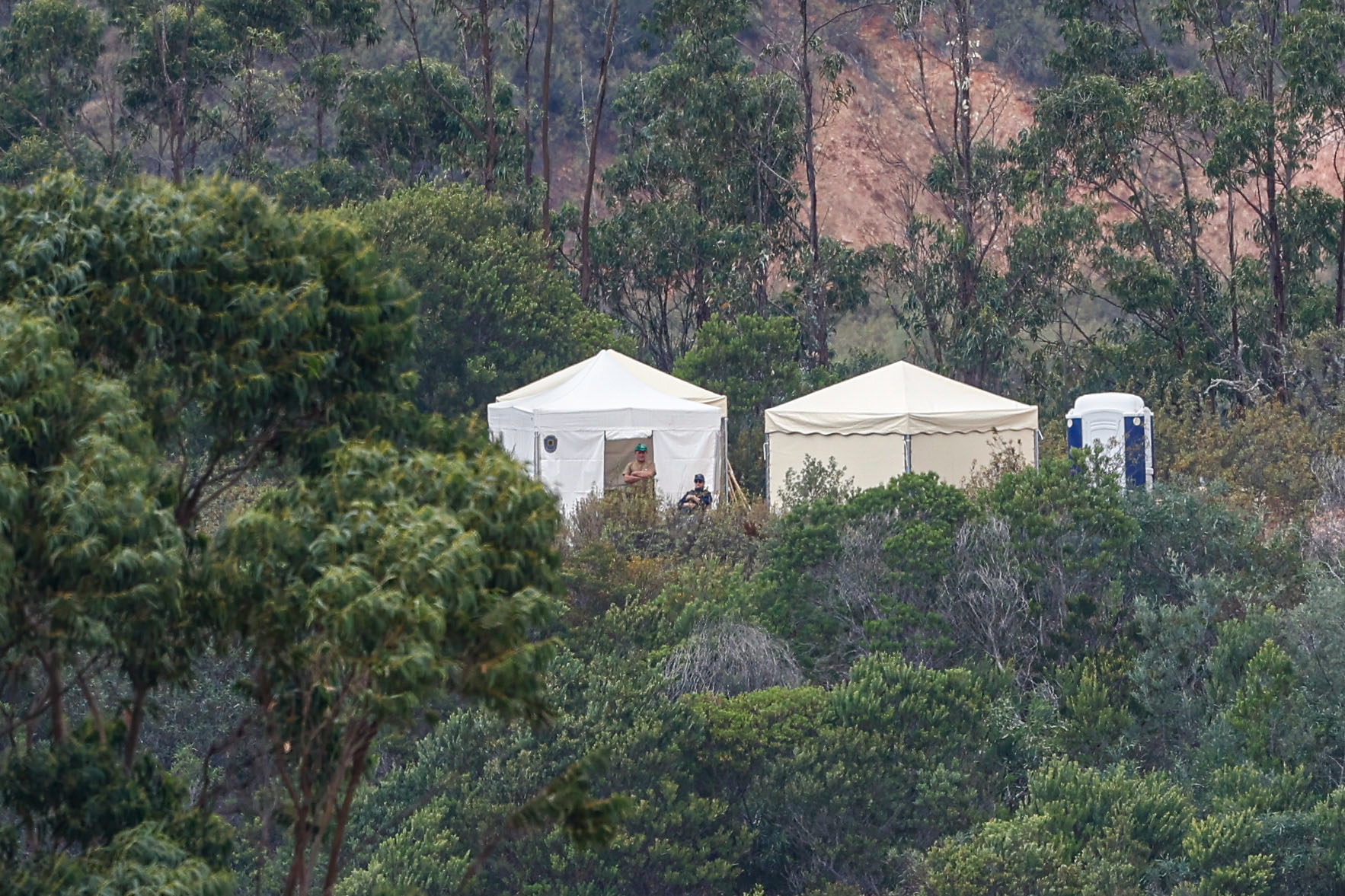 Cops are searching through dense undergrowth at the dam and reservoir