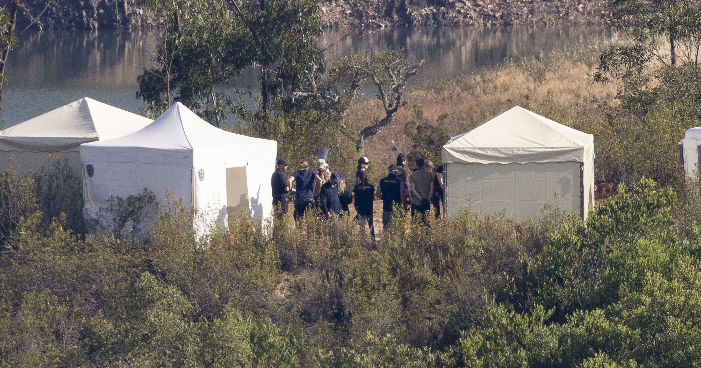 White tents pictured at the secluded site