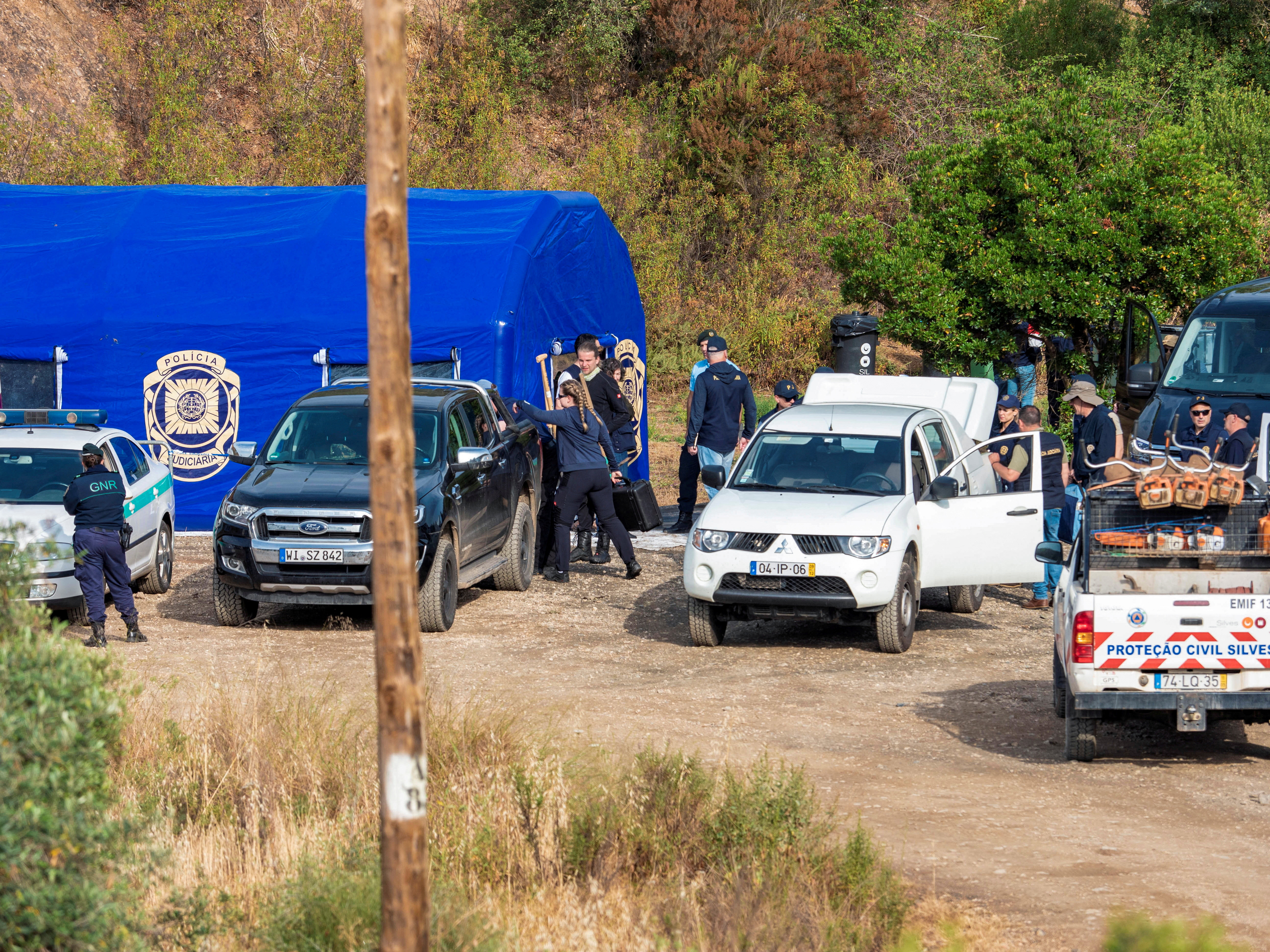 Police prepare to search a reservoir for the body of Madeleine McCann, who went missing in the Portuguese Algarve in May 2007, in Silves, Portugal, May 23, 2023. REUTERS/Luis Ferreira NO RESALES. NO ARCHIVES.