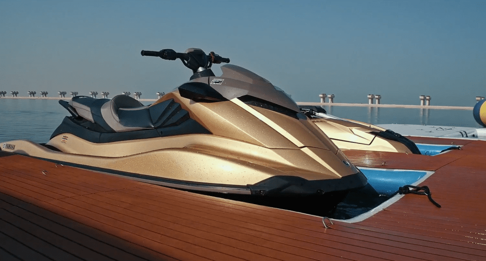 Even jet-skis and underwater scooters are covered in gold