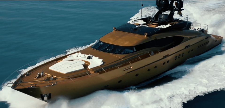 The world's only 24-karat gold covered sports yacht costs £100,000 a week