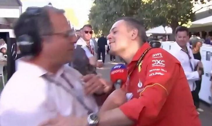 Ferrari sporting director Diego Loverno also leaned in to kiss Kravitz after the race