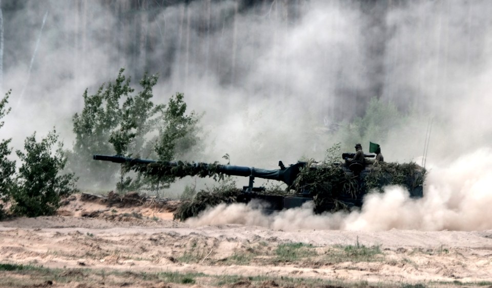 The German Army's armoured howitzer Panzerhaubitze 2000 is seen in action