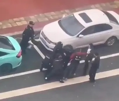 Footage circulating on social media appears to capture the moment the alleged suspect was apprehended by police