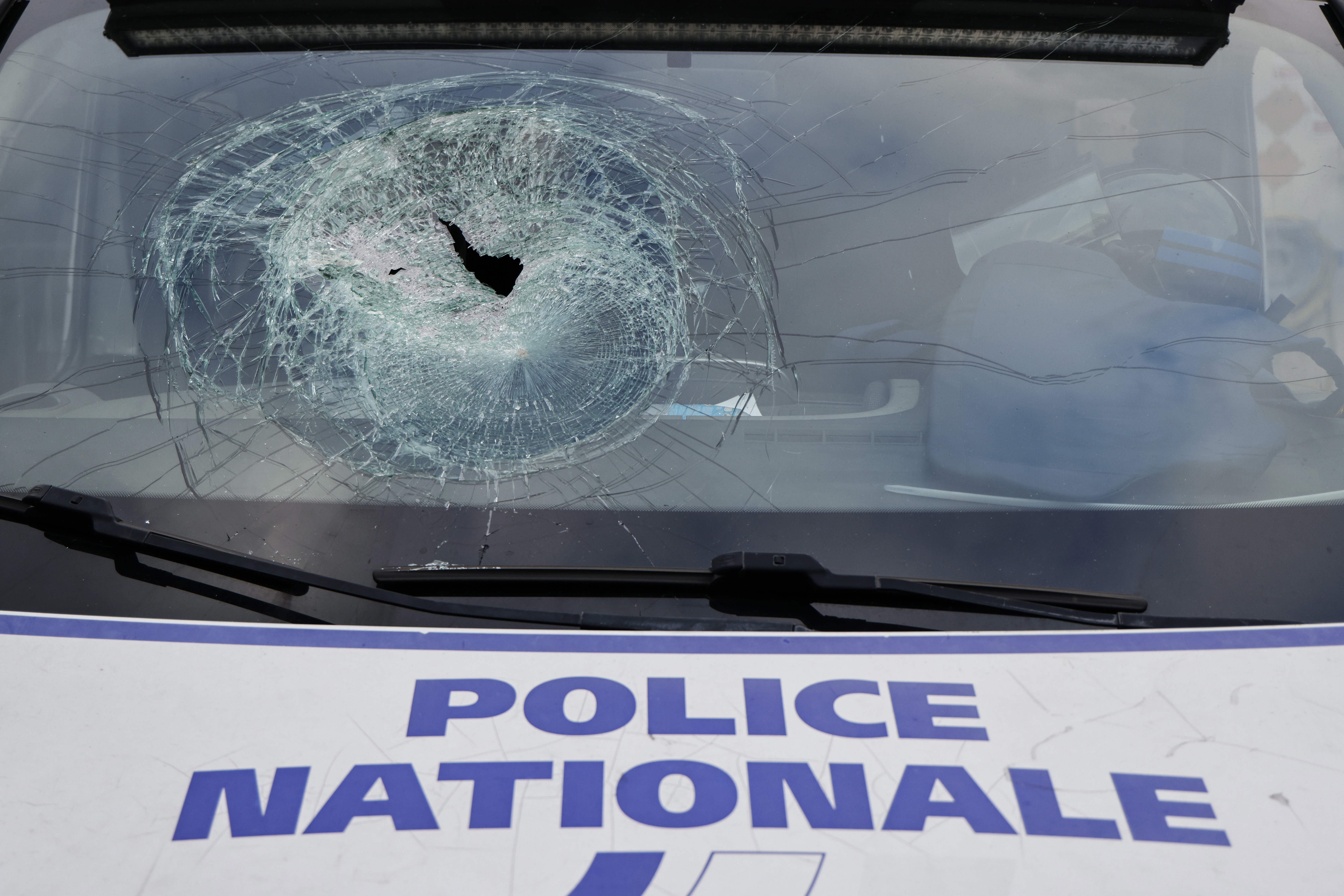 A police vehicle damaged during the recent riots