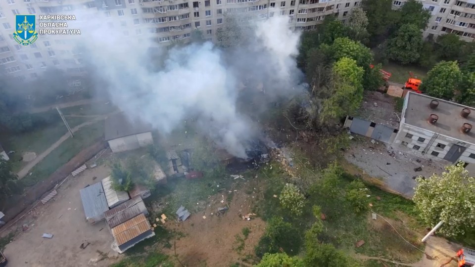 Smoke rises in the aftermath of a Russian strike in Kharkiv