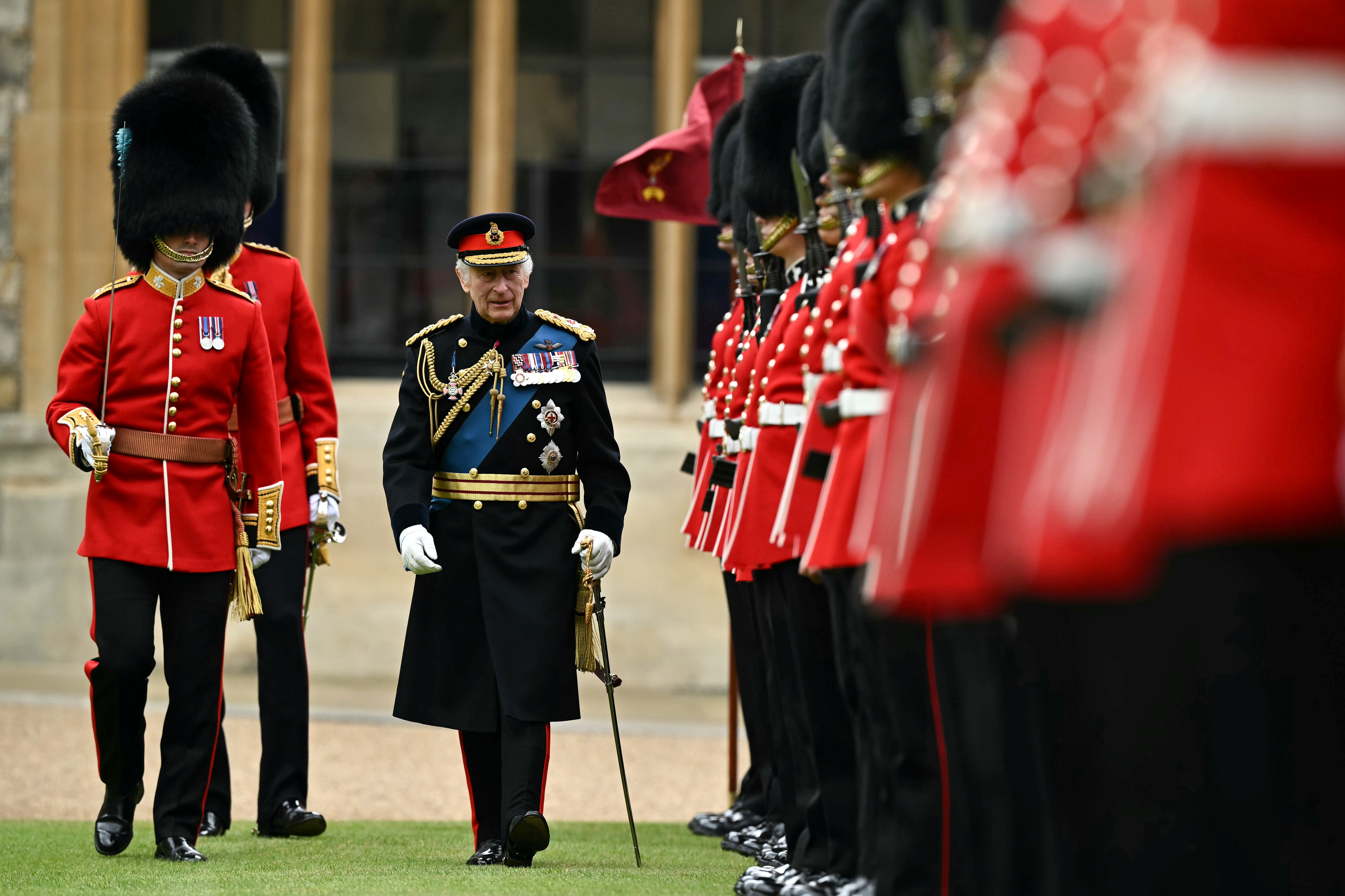 The King presented new colours to the Irish Guards at Windsor Castle today