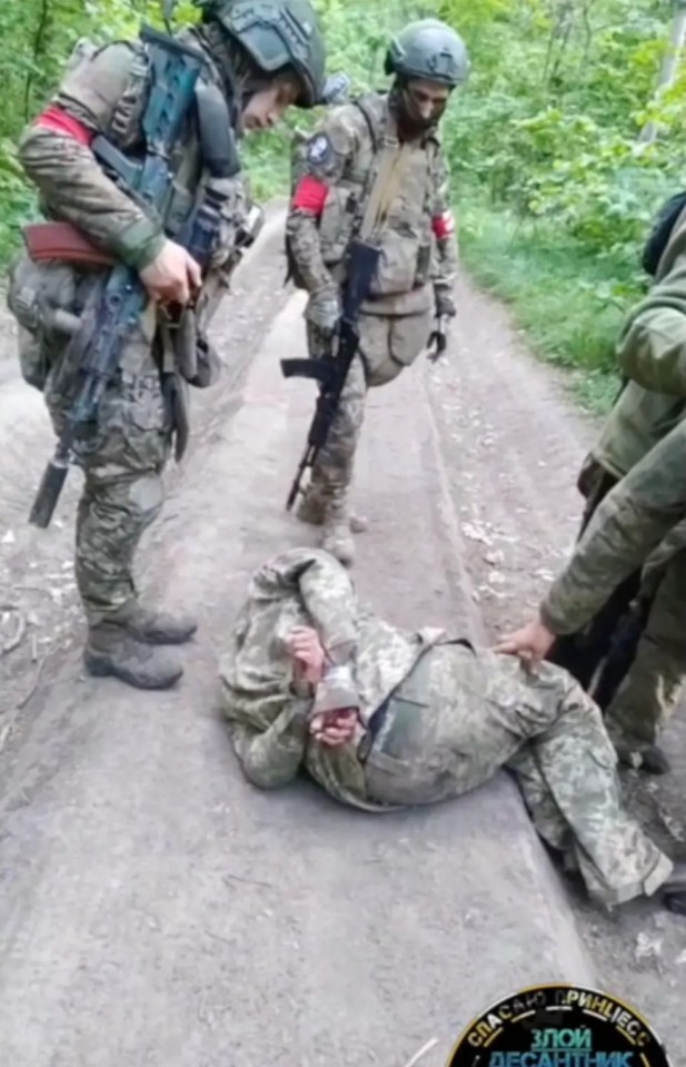 One Ukrainian man falls and seems unable to get up