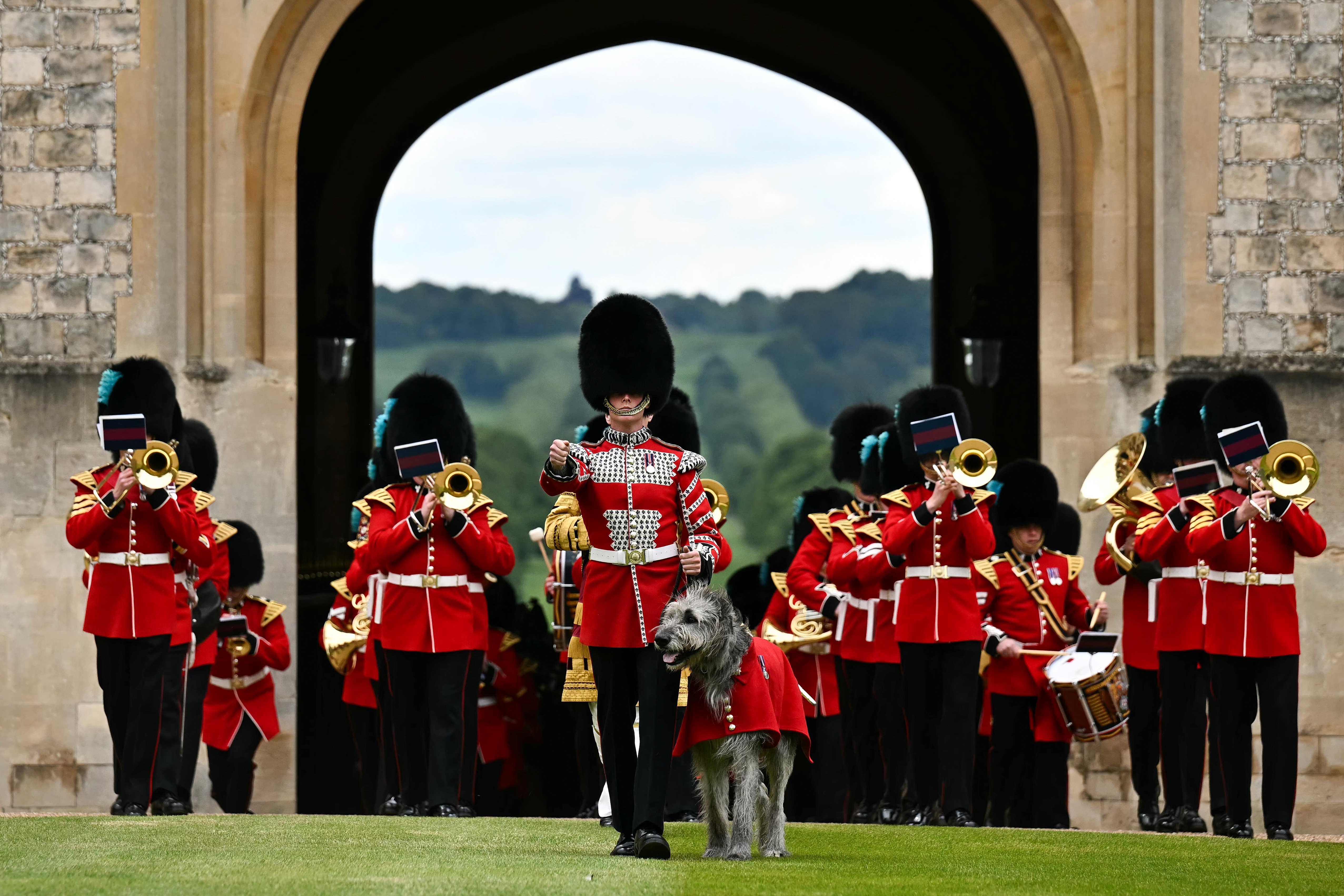 The presentation of new colours to No 9 and No 12 Company started with the Band of the Irish Guards marching them into Windsor Castle