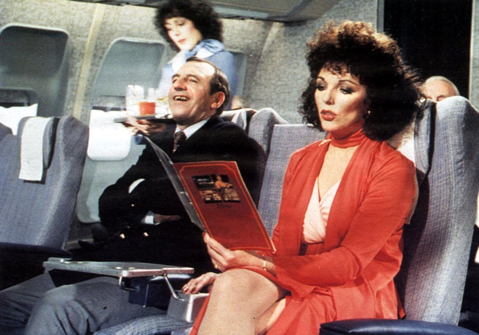 Joan Collins and Leonard Rossiter appear on a plane for a Cinzano Bianco ad