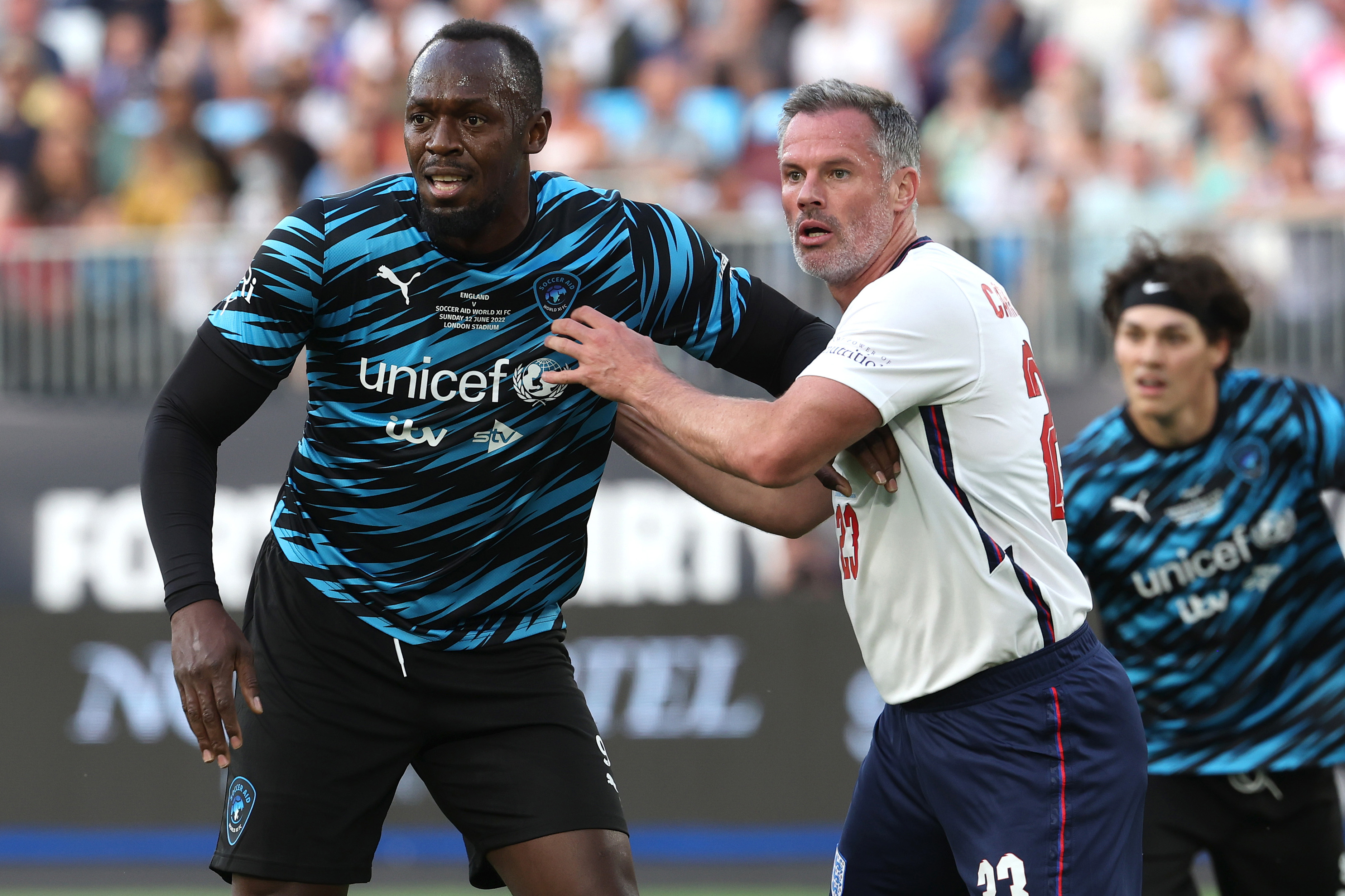  Usain Bolt facing off against Jamie Carragher during Soccer Aid 2022