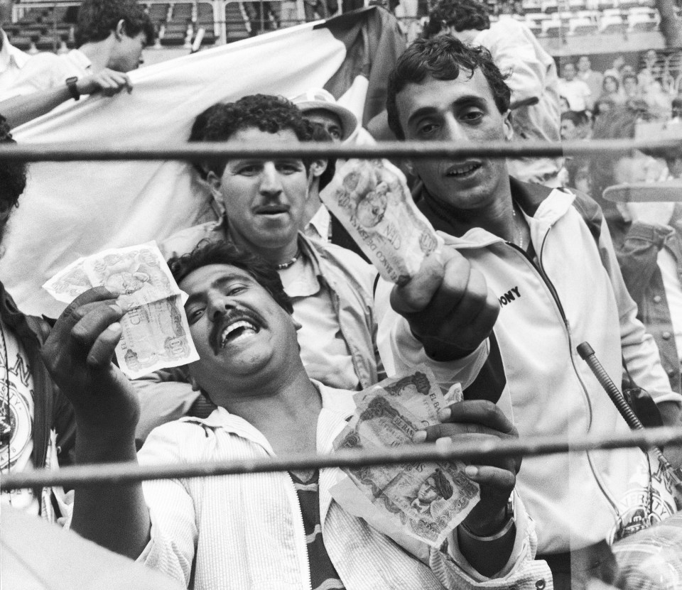 Algeria fans held money up to photographers, alleging there had been a fix between West Germany and Austria