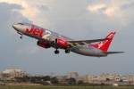 a jet 2 plane is taking off from a runway