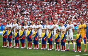 MUNICH, GERMANY - JUNE 20: Players of Slovenia sing their national anthem before the UEFA EURO 2024 group stage match between Slovenia and Serbia at the Munich Football Arena on June 20, 2024 in Munich, Germany. (Photo by Gokhan Balci/Anadolu via Getty Images)