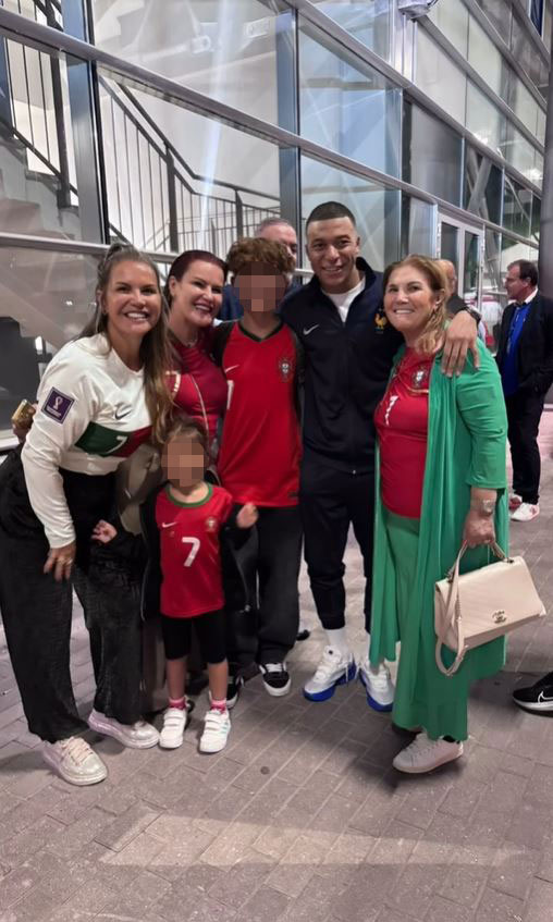 Kylian Mbappe posed for a picture with Cristiano Ronaldo's family