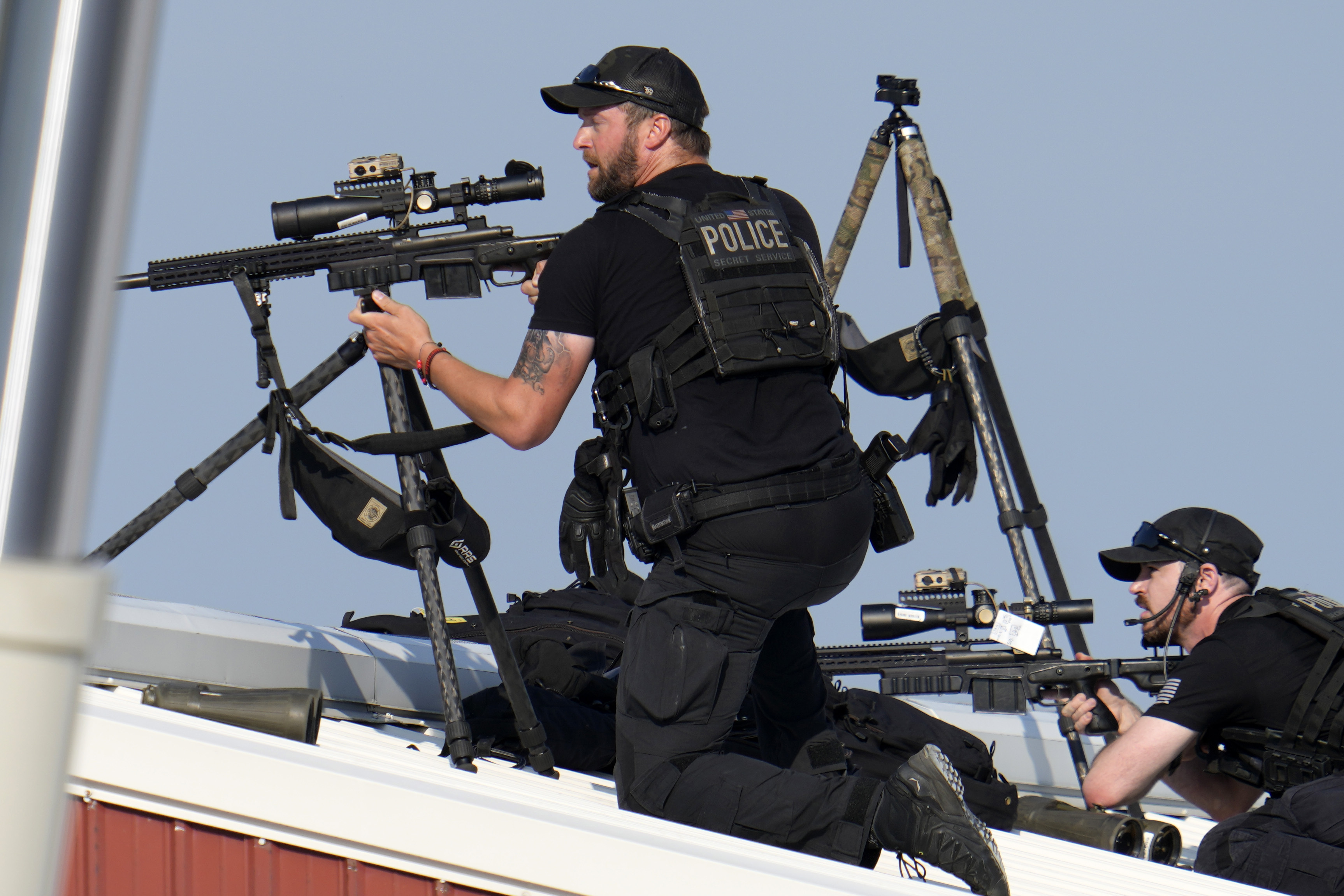 Snipers poised on a roof at the event