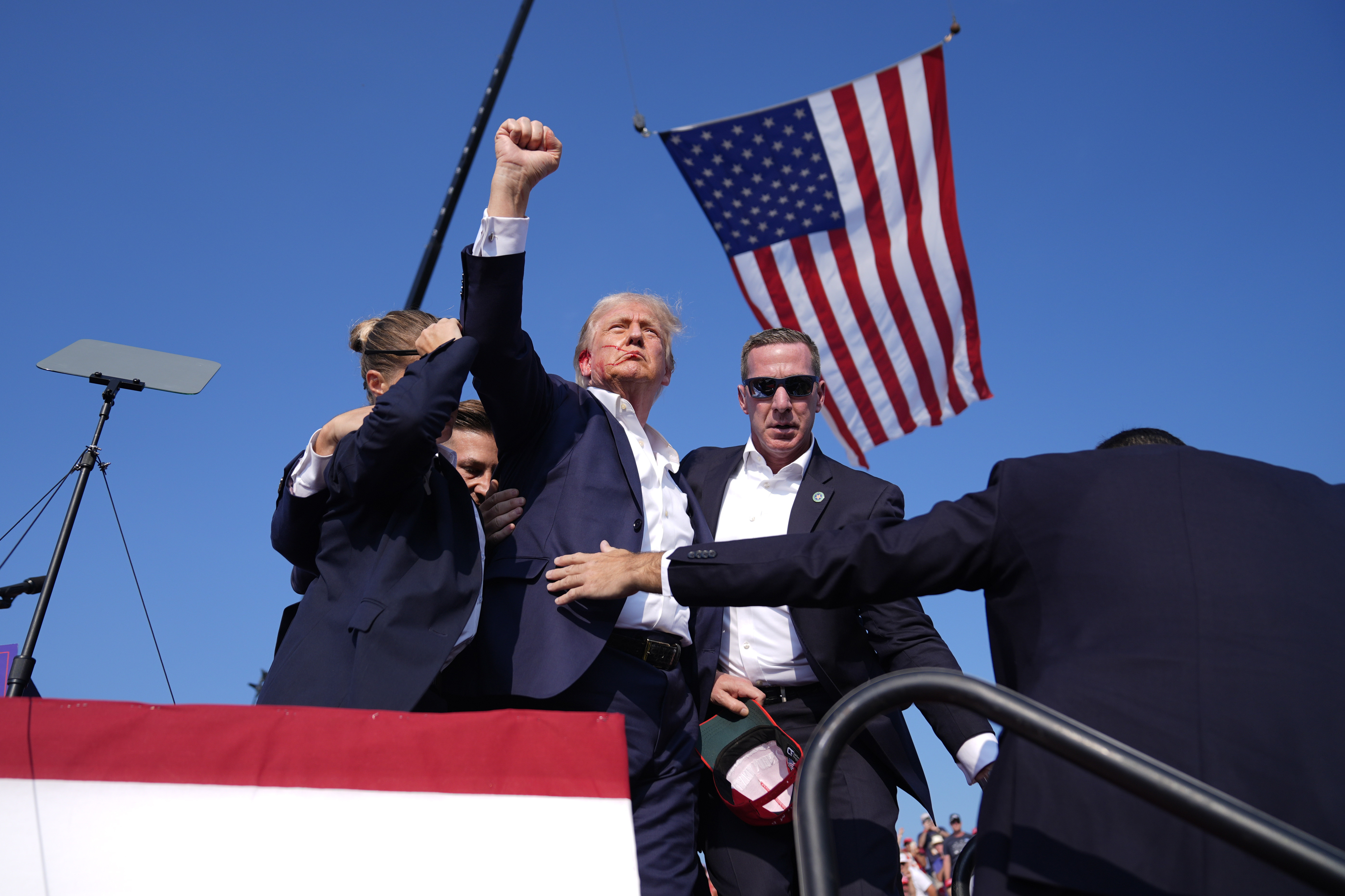 Trump pumped his fist in the air and mouthed 'Fight, Fight, Fight'