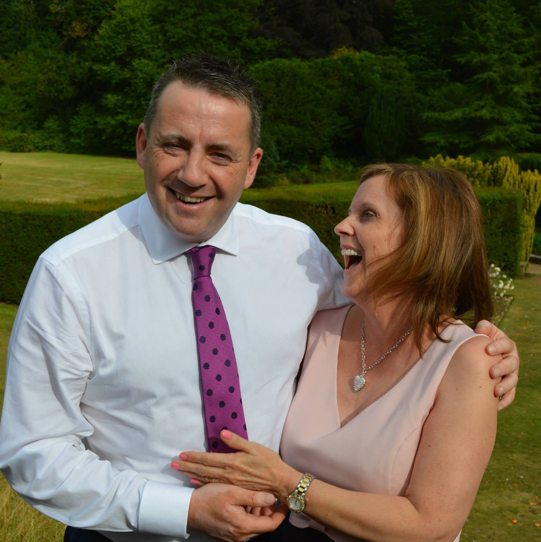 Louise and Hannah's father John Hunt with their mum Carol, who was the third victim