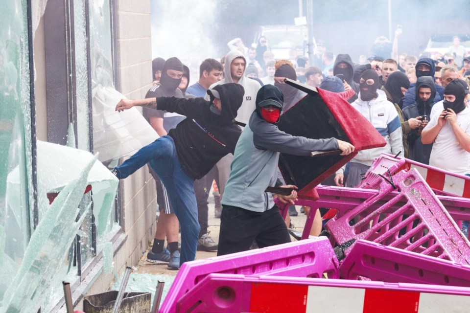 Trouble flares during an anti-immigration protest outside the hotel in Rotherham