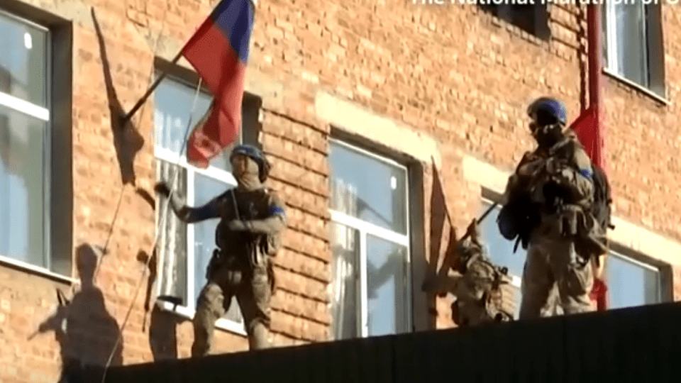 Ukrainian TV footage appeared to show soldiers in Sudzha ripping down a Russian flag