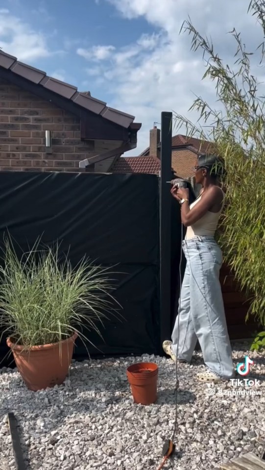 She then put concrete nails to attach the battens to the fence panels