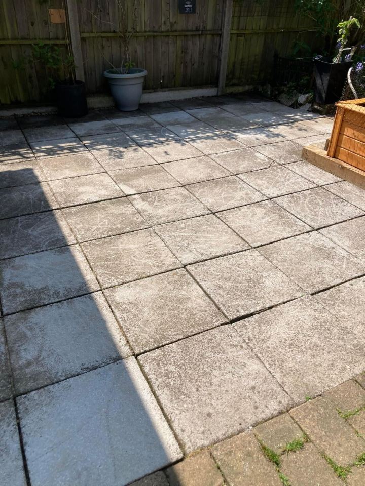 She first jet washed the paving slabs