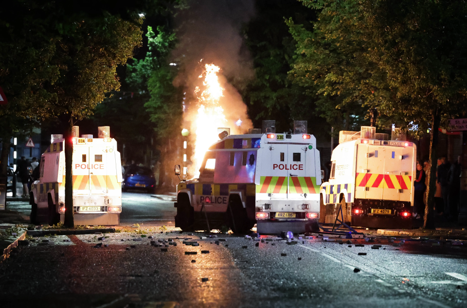 Rioters in south Belfast lobbed petrol bombs at police vans