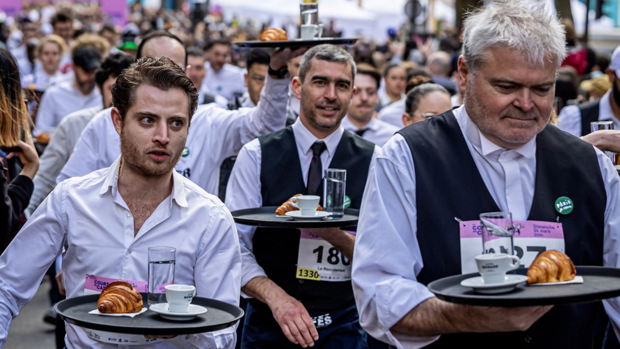Parisian waiters race to promote Olympics