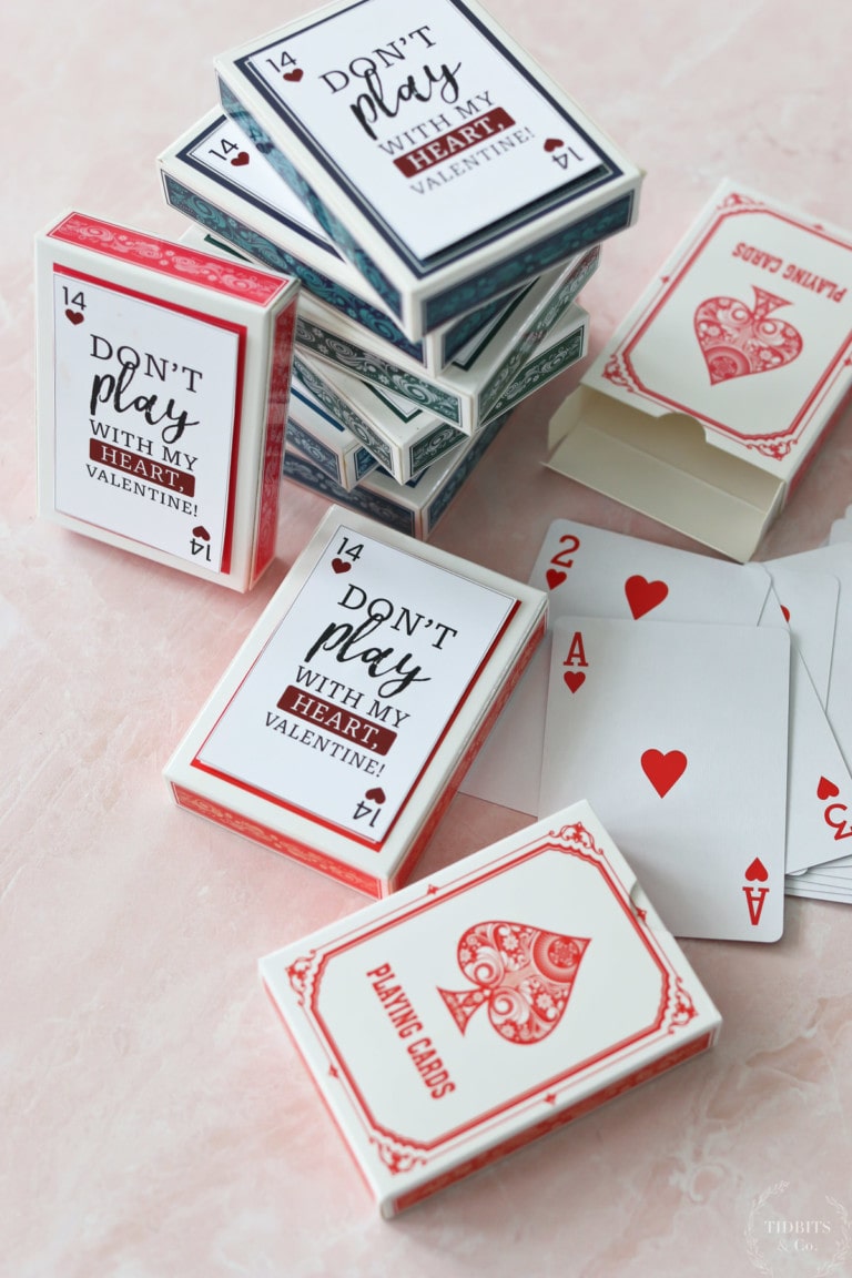 Stacks of playing cards and sit on a table