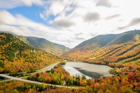 View over Franconia Notch State Park erupting in fall color