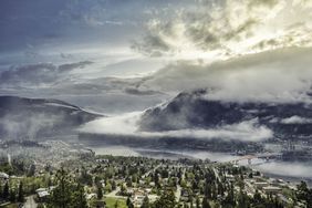 The city of Nelson alongside Kootenay Lake