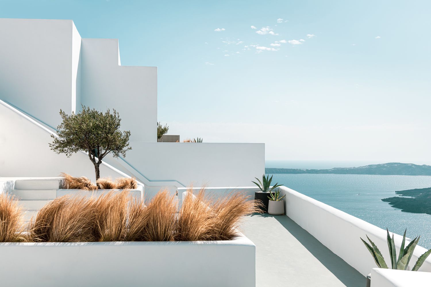 White walled hotel terrace in Santorini, Greece