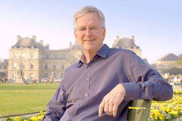 Rick Steves takes a break from filming at the Louvre Museum in Paris, France
