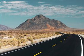 Highway 127 in the Mojave Desert near Death Valley, looking north, showing Eagle Mountain in the background.