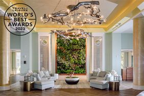 Lobby area of The Westin Hilton Head Island Resort & Spa with an ornate chandellier and a larger than life painting