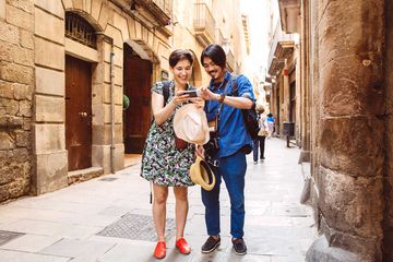 People using smartphone on Barcelona street, Spain