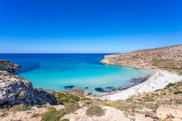 Rabbit Island Lampedusa “Spiaggia dei Conigli” with turquoise water and white sand at paradise beach.